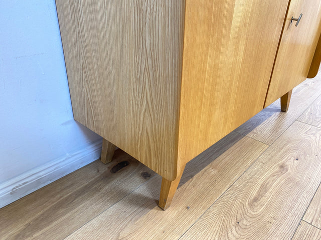 WMK I Stilvoller und sehr gut erhaltener heller Mid-Century Bücherschrank von Musterring mit verstellbaren Regalböden I Bücherregal Regal Kommode Sideboard Highboard Vintage 60er Berlin Kassel Bremen