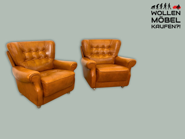 Schöner und sehr bequemer Mid-Century Sessel mit cognacfarbenem Echtleder Bezug.