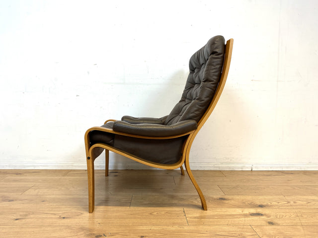 Stilvoller skandinavischer Sessel mit gestepptem braunem Echtleder Bezug I Norwegen 1970er I Ledersessel Loungesessel Relax Lesesessel Sitzgarnitur Mid-Century Vintage Leder I