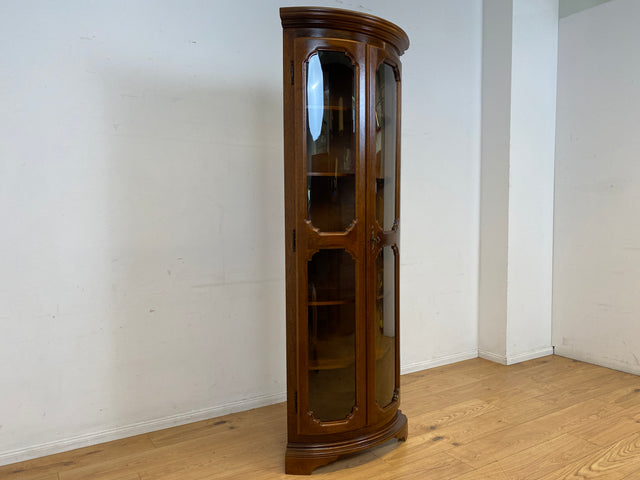 Hochwertige und sehr gut erhaltene Stilmöbel Eckvitrine aus vollem Holz mit ovalen Gläsern