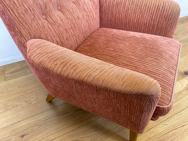 WMK I Formschöner & sehr gut erhaltener skandinavischer Mid-Century Sessel in Altrosa mit bequemen Federkernsitz